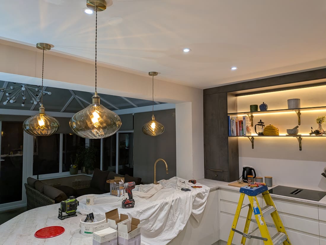 ABK Electrical kitchen lighting installation in Lincoln — pendant lights and recessed LED downlights being fitted
